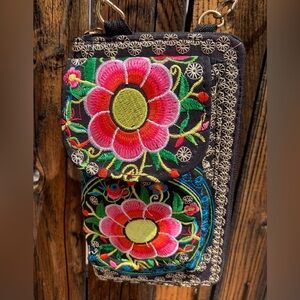 Floral Embroidered Wallet with slot for phone.